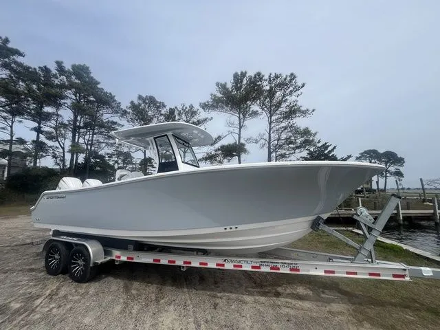The Image of 2026 Sportsman Open 252 Center Console on trailer, side view. - 1