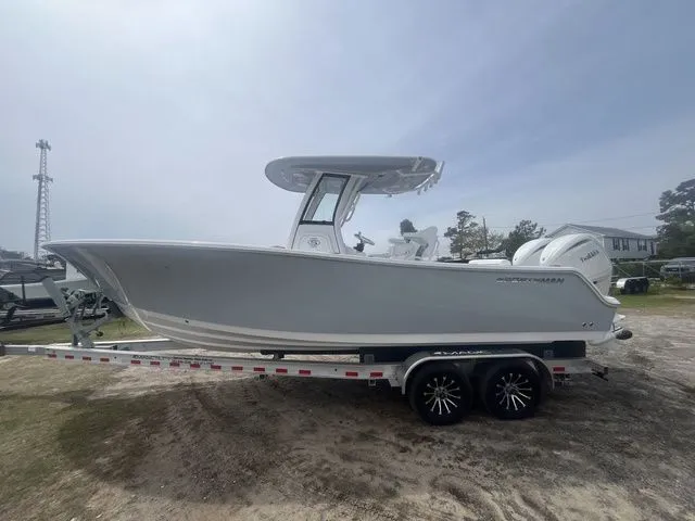 Slide: The Image of 2026 Sportsman Open 252 Center Console on trailer, side view. - 3