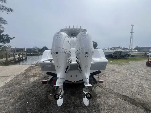 Slide: The Image of 2026 Sportsman Open 252 Center Console with dual outboard engines. - 5