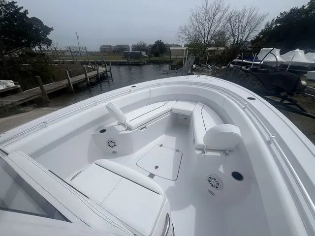 Slide: The Image of 2026 Sportsman Open 252 Center Console boat at dock. - 8