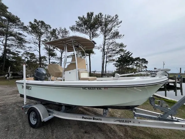 The Image of 2019 Parker 1801 Center Console boat on trailer, side view. - 1