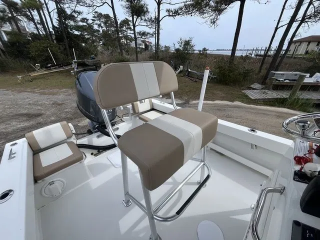 Slide: The Image of 2019 Parker 1801 Center Console boat with seating and motor. - 11