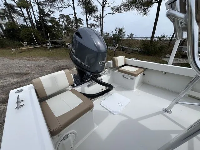 Slide: The Image of 2019 Parker 1801 Center Console boat with outboard motor. - 12