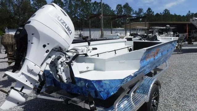 Slide: The Image of 2026 Excel Boats Viper F4 1751 with Suzuki engine on trailer. - 2