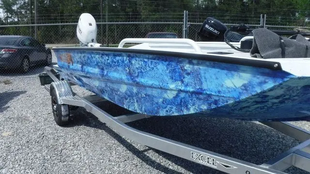 Slide: The Image of 2026 Excel Boats Viper F4 1751 with blue design on trailer. - 6