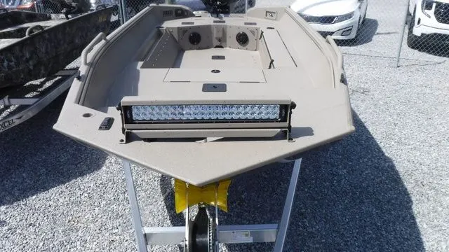 Slide: The Image of 2026 Excel Boats River Warrior 1751 on a trailer, front view. - 3