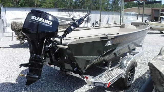 Slide: The Image of 2026 Excel Boats River Warrior 1751 with Suzuki engine on trailer. - 5