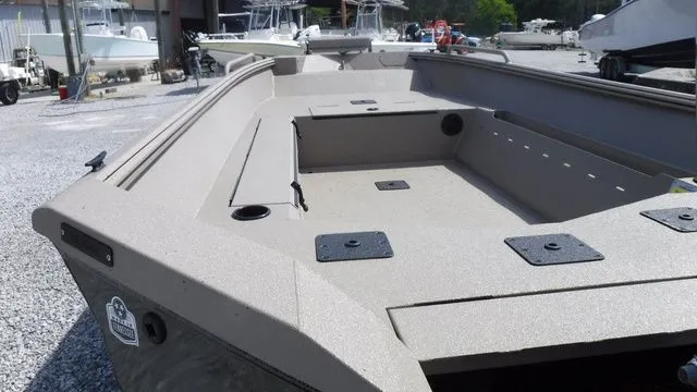 Slide: The Image of 2026 Excel Boats River Warrior 1751 at a boatyard. - 8