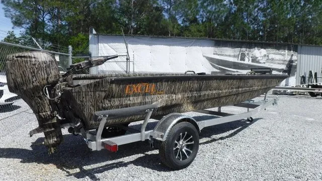 The Image of 2026 Excel Boats Eclipse 17’ on trailer, parked outdoors. - 1