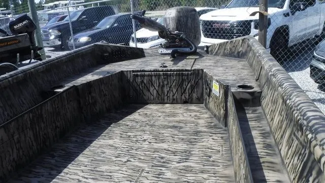 Slide: The Image of 2026 Excel Boats Eclipse 17’ with camouflage pattern design. - 5