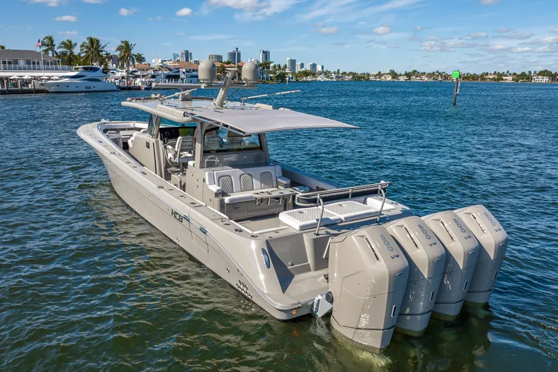 Slide: The Image of 2024 HCB 53 Suenos luxury boat with quad engines on a sunny day. - 11