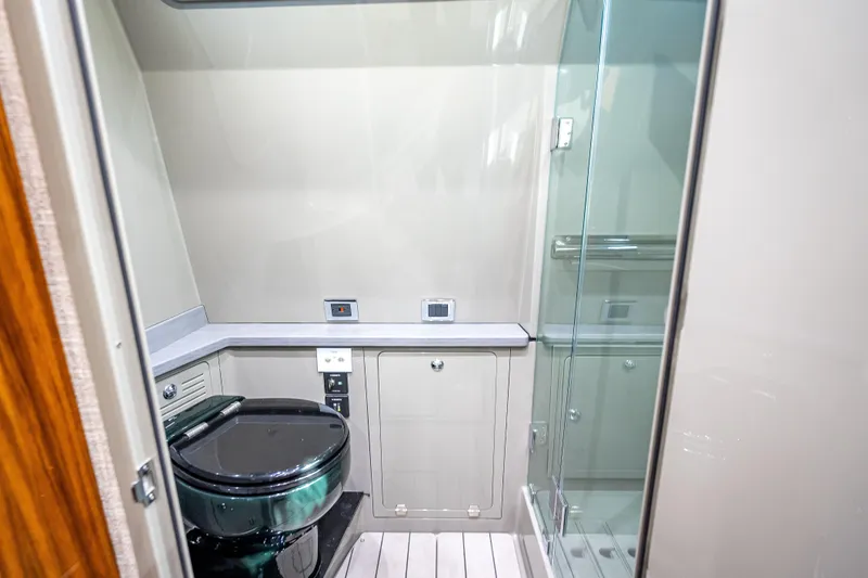 Slide: The Image of Luxurious bathroom interior of 2024 HCB 53 Suenos yacht with modern fixtures and glass shower. - 30