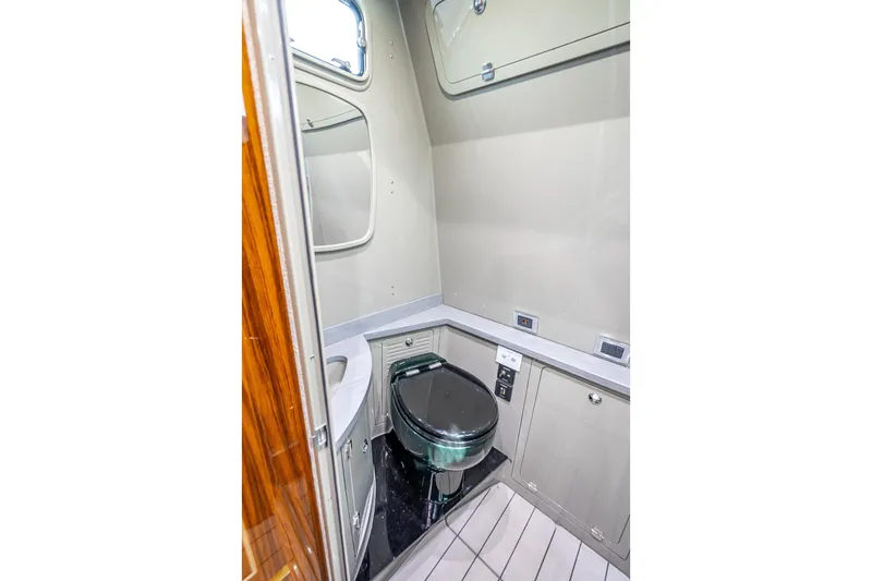 Slide: The Image of Luxurious bathroom interior of 2024 HCB 53 Suenos yacht, featuring modern fixtures and cabinetry. - 31