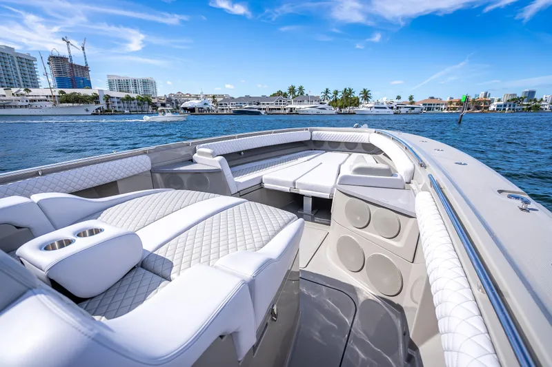 Slide: The Image of Luxurious 2024 HCB 53 Suenos boat interior with plush seating on a sunny day. - 35