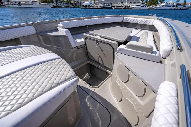 Slide: The Image of Luxurious interior of 2024 HCB 53 Suenos boat with quilted seating and table. - 42