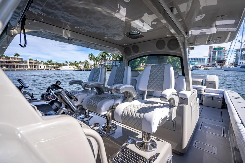 Slide: The Image of Luxurious interior of 2024 HCB 53 Suenos boat with plush seating and waterfront view. - 45