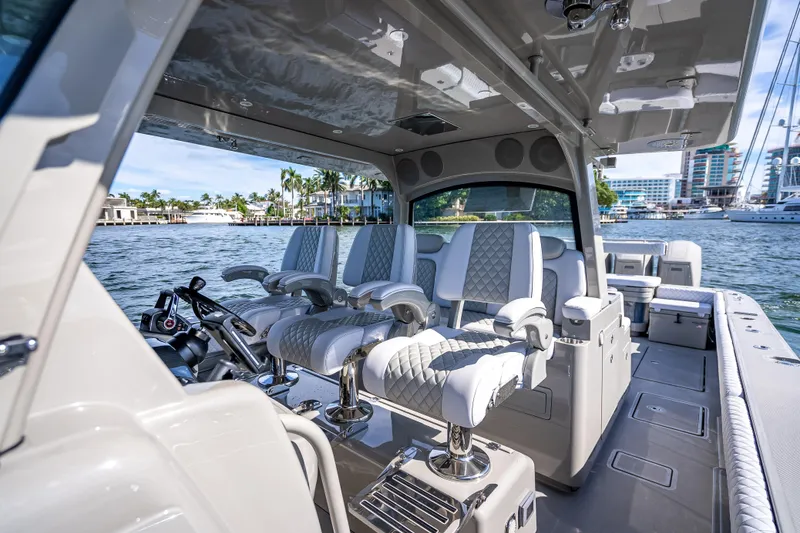 Slide: The Image of Luxurious interior of 2024 HCB 53 Suenos boat with plush seating and waterfront view. - 46