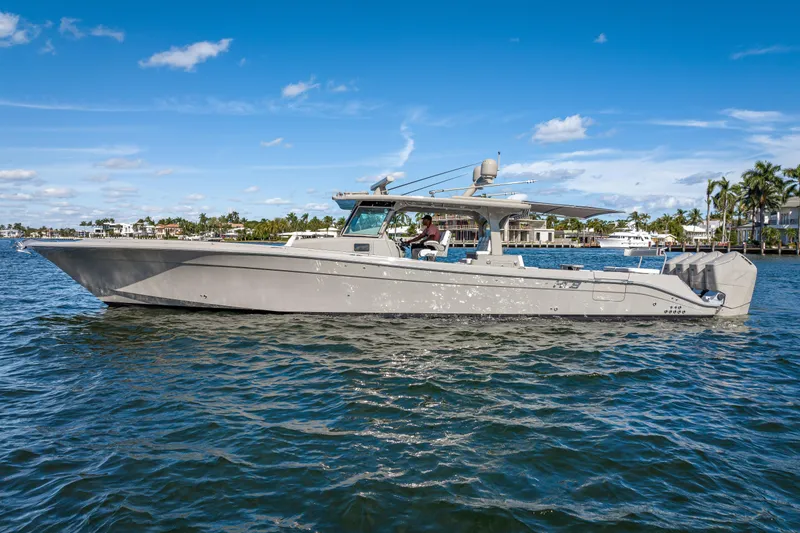 Slide: The Image of 2024 HCB 53 Suenos luxury boat cruising on a sunny day. - 6