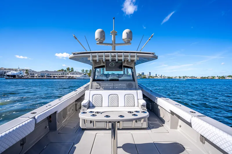 Slide: The Image of 2024 HCB 53 Suenos boat on water, featuring spacious seating and modern design. - 64