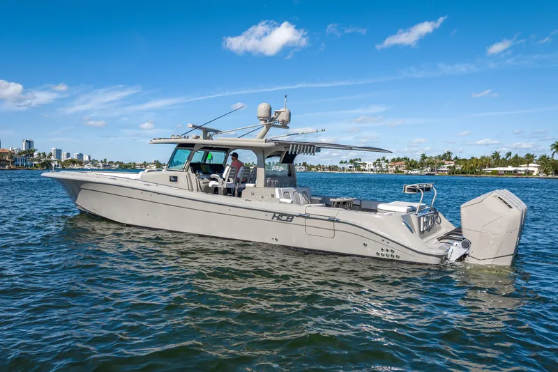 Slide: The Image of 2024 HCB 53 Suenos luxury boat cruising on a sunny day. - 7