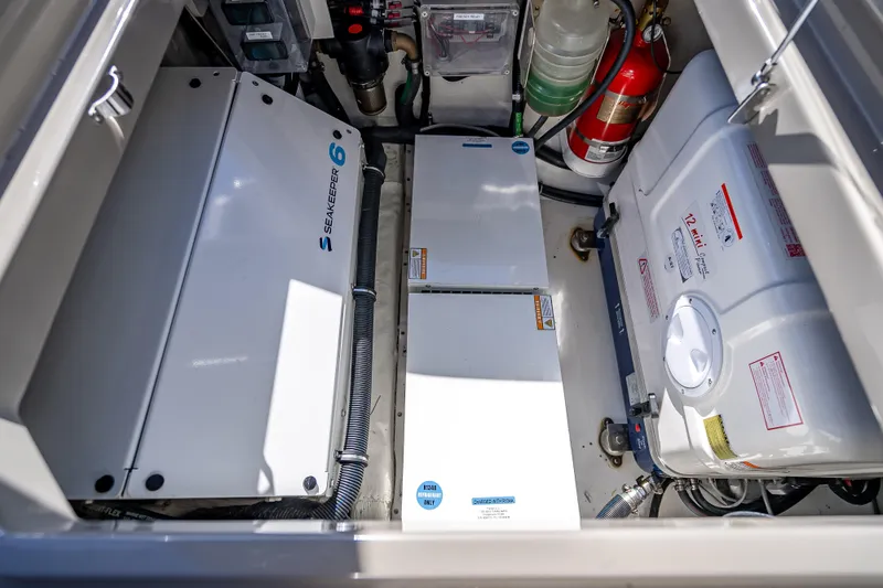 Slide: The Image of Engine room of 2024 HCB 53 Suenos featuring Seakeeper 6 and safety equipment. - 78