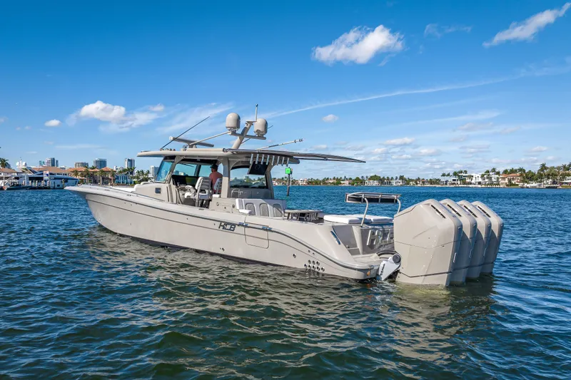 Slide: The Image of 2024 HCB 53 Suenos luxury boat cruising on a sunny day. - 8