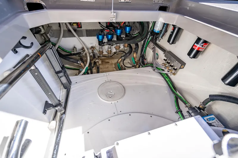 Slide: The Image of Engine room of 2024 HCB 53 Suenos boat, showcasing mechanical components and wiring. - 81