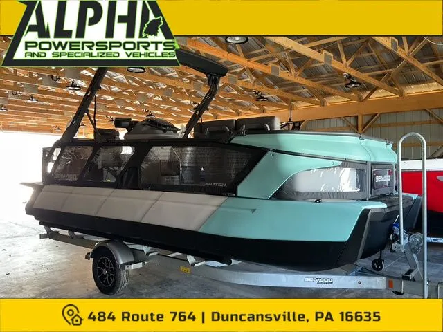 The Image of 2026 Sea-Doo Switch Cruise 21 in a storage facility. - 1