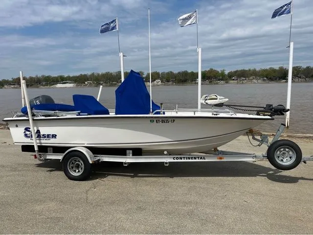 The Image of 2005 Sea Chaser 1950 RG boat on trailer by riverside. - 1