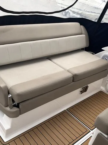 Slide: The Image of Regal Express Cruiser 30, 2014, seating area with beige upholstery. - 13