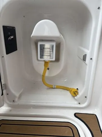 Slide: The Image of Regal Express Cruiser 30 2014 power connection with yellow cable. - 15