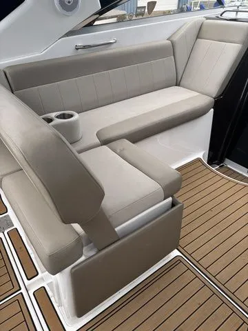 Slide: The Image of Interior of 2014 Regal Express Cruiser 30 with beige seating. - 16