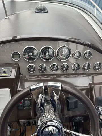 Slide: The Image of Dashboard of a 2014 Regal Express Cruiser 30 boat. - 19