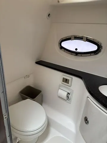 Slide: The Image of Interior of Regal Express Cruiser 30, 2014, bathroom view. - 24