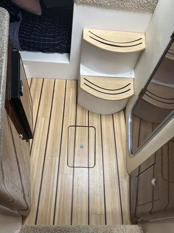 Slide: The Image of Interior of 2014 Regal Express Cruiser 30 with wooden flooring. - 29