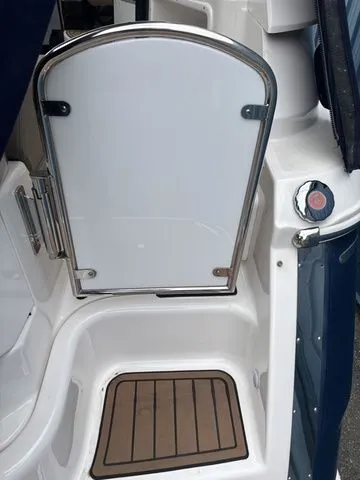 Slide: The Image of Regal Express Cruiser 30, 2014, boat door and deck area. - 37