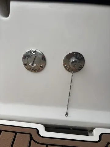 Slide: The Image of Regal Express Cruiser 30 2014, waste and water connections. - 38