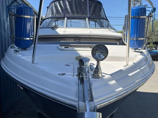 Slide: The Image of 2014 Regal Express Cruiser 30, front view with blue fenders. - 5