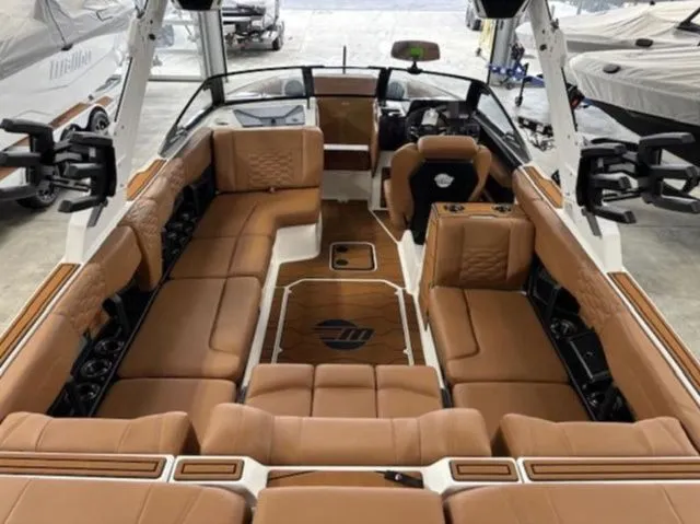 Slide: The Image of Interior of 2026 Malibu Wakesetter 24 MXZ with luxurious leather seating. - 10