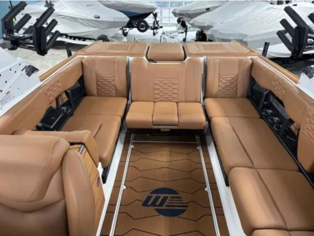 Slide: The Image of Interior of 2026 Malibu Wakesetter 24 MXZ with luxurious leather seating. - 12