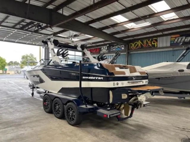 Slide: The Image of 2026 Malibu Wakesetter 24 MXZ boat in warehouse. - 3