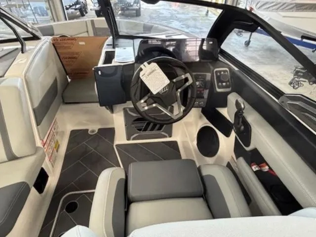 Slide: The Image of Interior of 2026 Malibu Wakesetter 23 LSV with modern helm. - 11