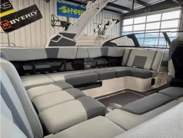 Slide: The Image of Interior of 2026 Malibu Wakesetter 23 LSV with gray upholstery. - 12