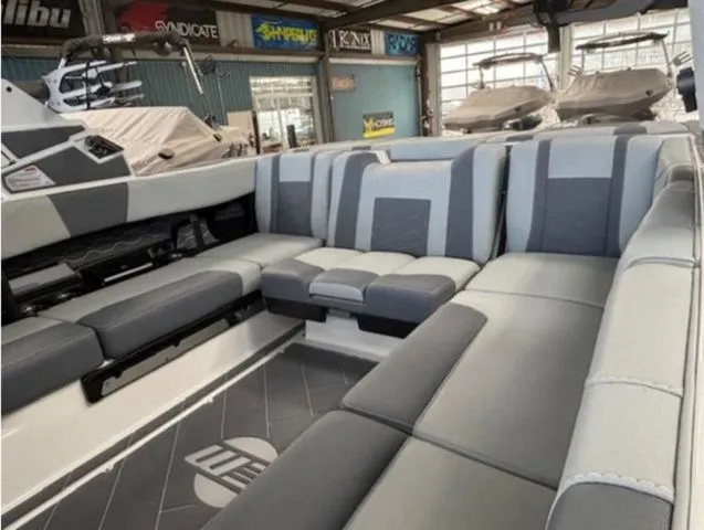 Slide: The Image of Interior of 2026 Malibu Wakesetter 23 LSV with gray upholstery. - 13