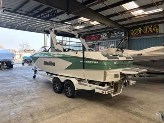 Slide: The Image of 2026 Malibu Wakesetter 23 LSV boat in warehouse. - 3