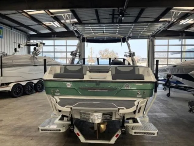 Slide: The Image of 2026 Malibu Wakesetter 23 LSV in a boat workshop. - 4