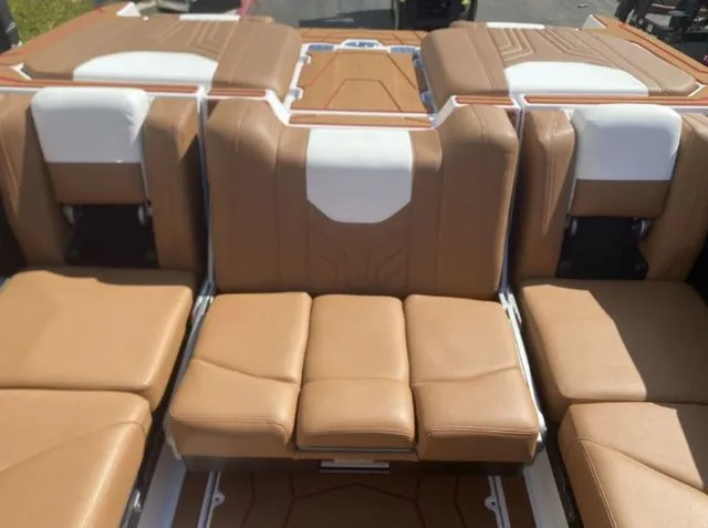 Slide: The Image of Interior of 2026 Malibu Wakesetter 25 LSV with brown leather seats. - 11
