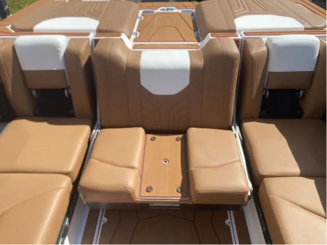 Slide: The Image of Interior of 2026 Malibu Wakesetter 25 LSV with brown leather seats. - 12