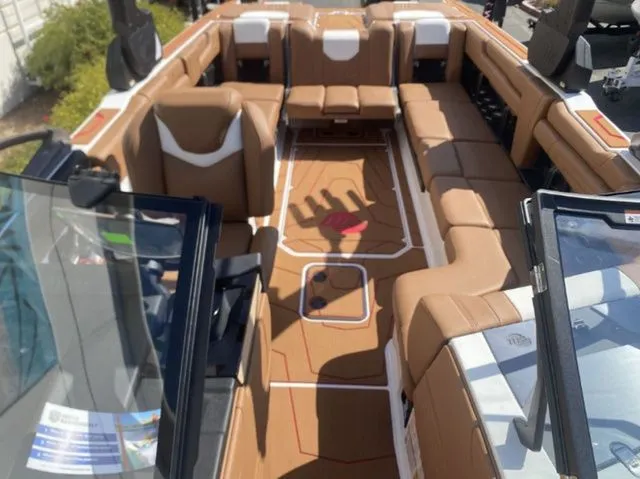 Slide: The Image of Interior of 2026 Malibu Wakesetter 25 LSV with luxurious seating. - 8