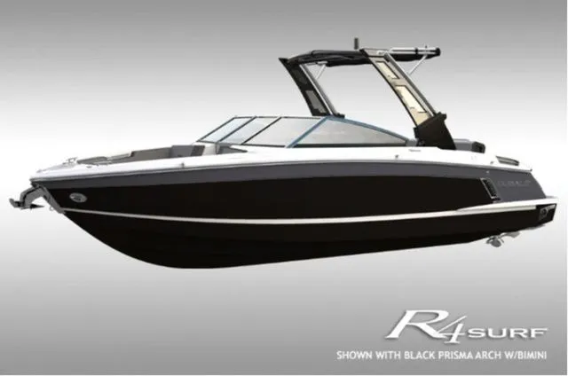 The Image of Cobalt R4 Surf 2026 with black Prisma arch and Bimini. - 1
